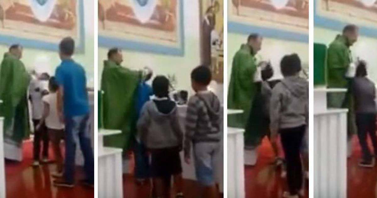 Prete schiaffeggia i bambini durante la prima comunione: “È la mia benedizione” [+ VIDEO]